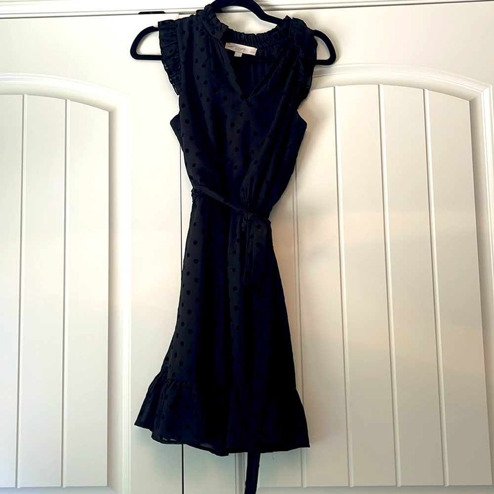 Mini black dress with ruffles